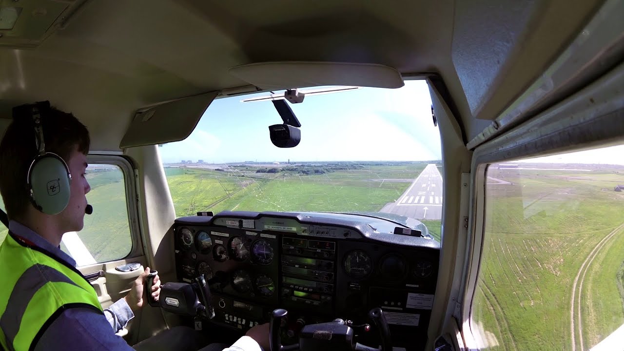 Lydd Airport Cessna 152 cockpit view approach and landing on runway 21