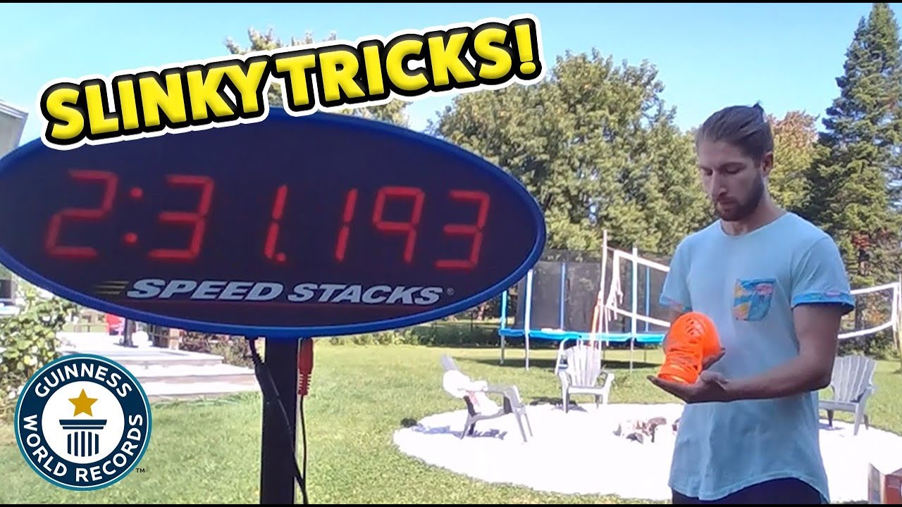 SLINKY TRICKS - Most hand-to-hand transfers of a slinky!