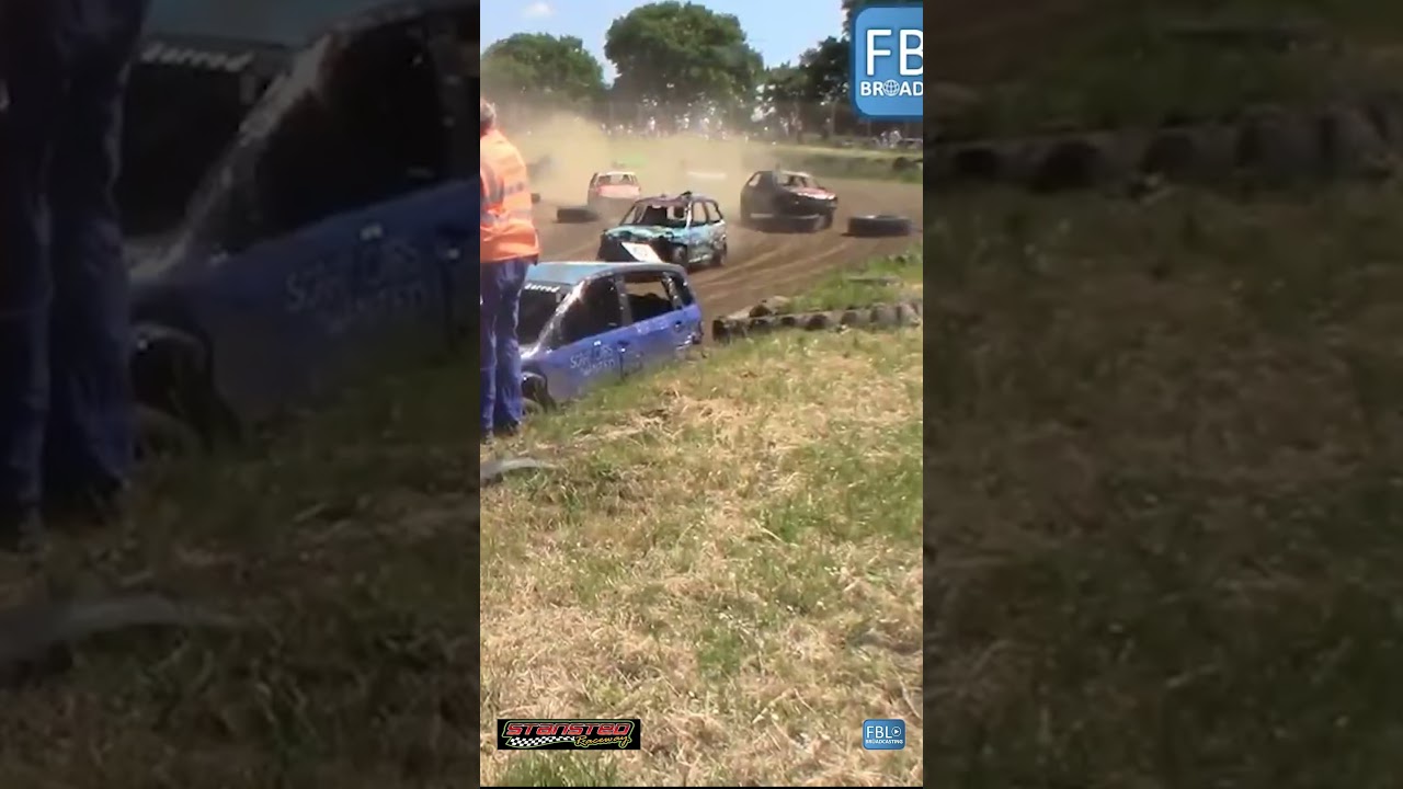 Short Junior Banger dodging tyres but rolling over. Stansted Raceway Banger Racing on 22nd May 2022