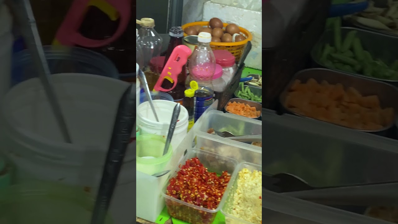 Street food in Bangkok make to order for Tom Yum Fried Rice very delicious thai food for 70thb