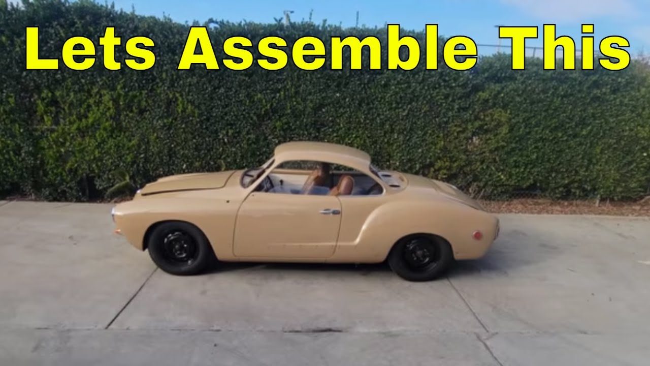 Реставрация Karmann Ghia 1968 года – сборка автомобиля после покраски.