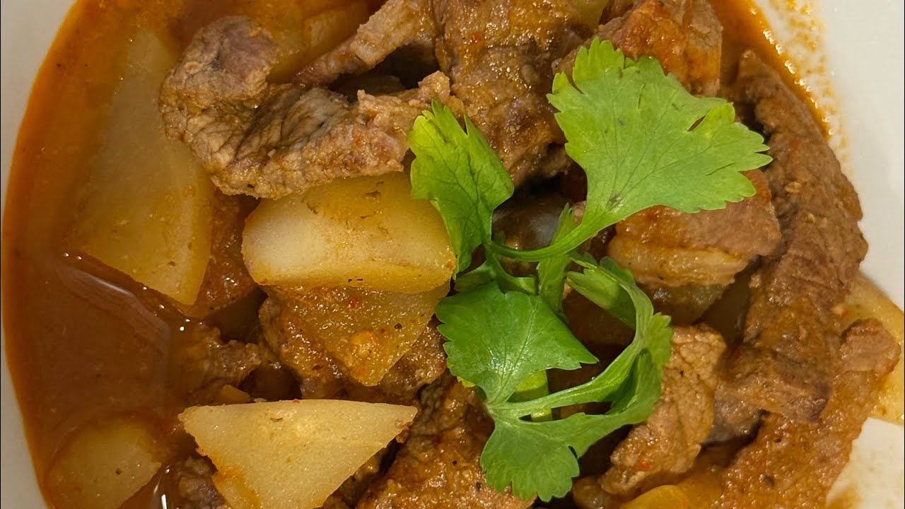 Bistec con papas en salsa