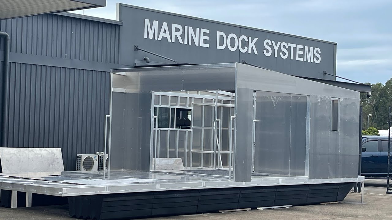 Houseboat build Polyethylene floats aluminium frame and aluminium cladding