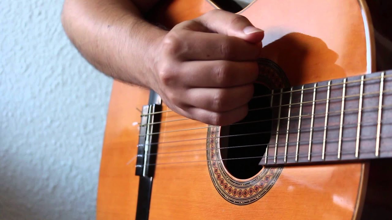 Como Rasguear en Guitarra.