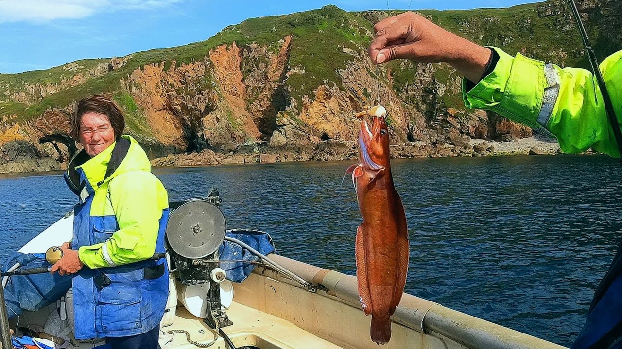 Fishing Wrasse Rockling With A Scenic View Along South Coast Cliffs