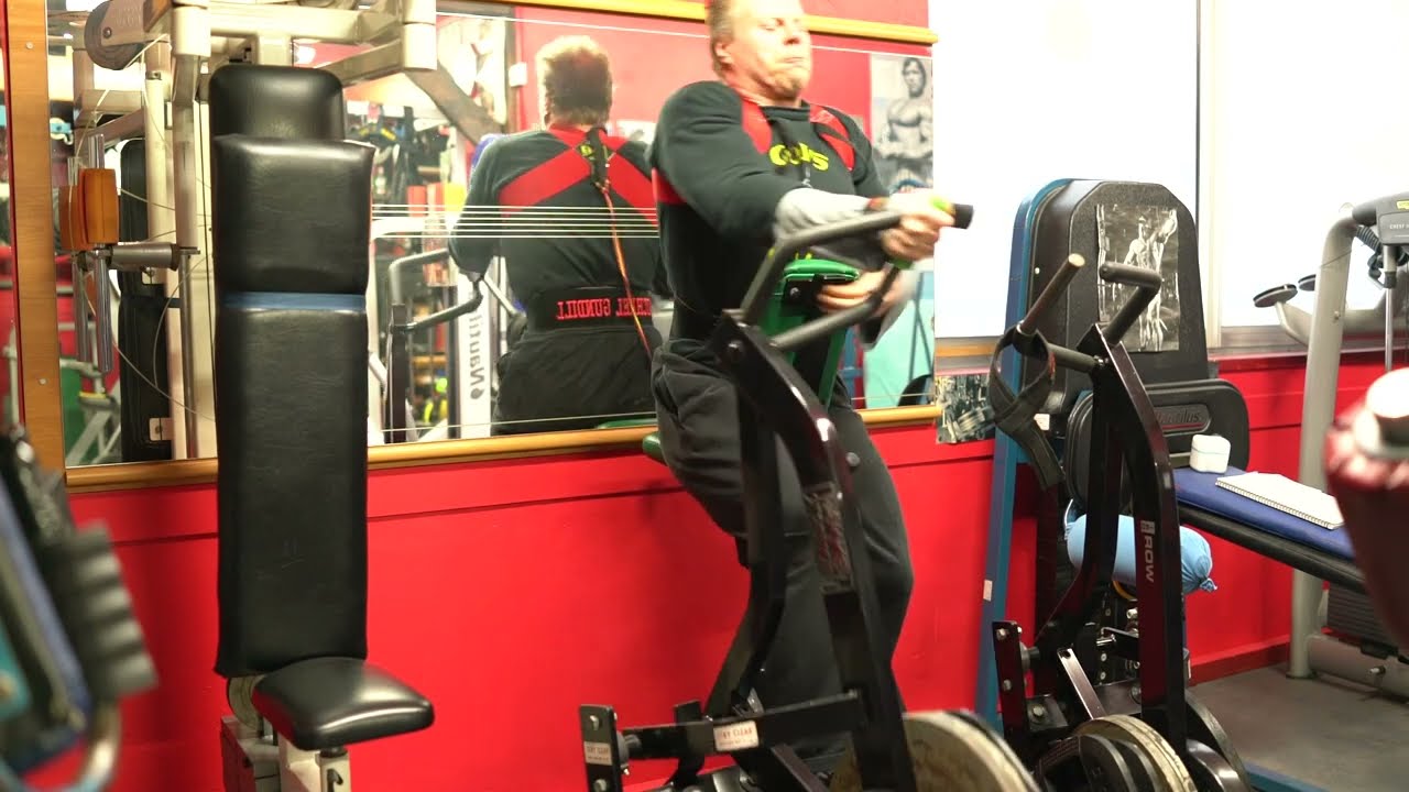 Michael Gundill, 1 arm row with Bowtie Posture Support