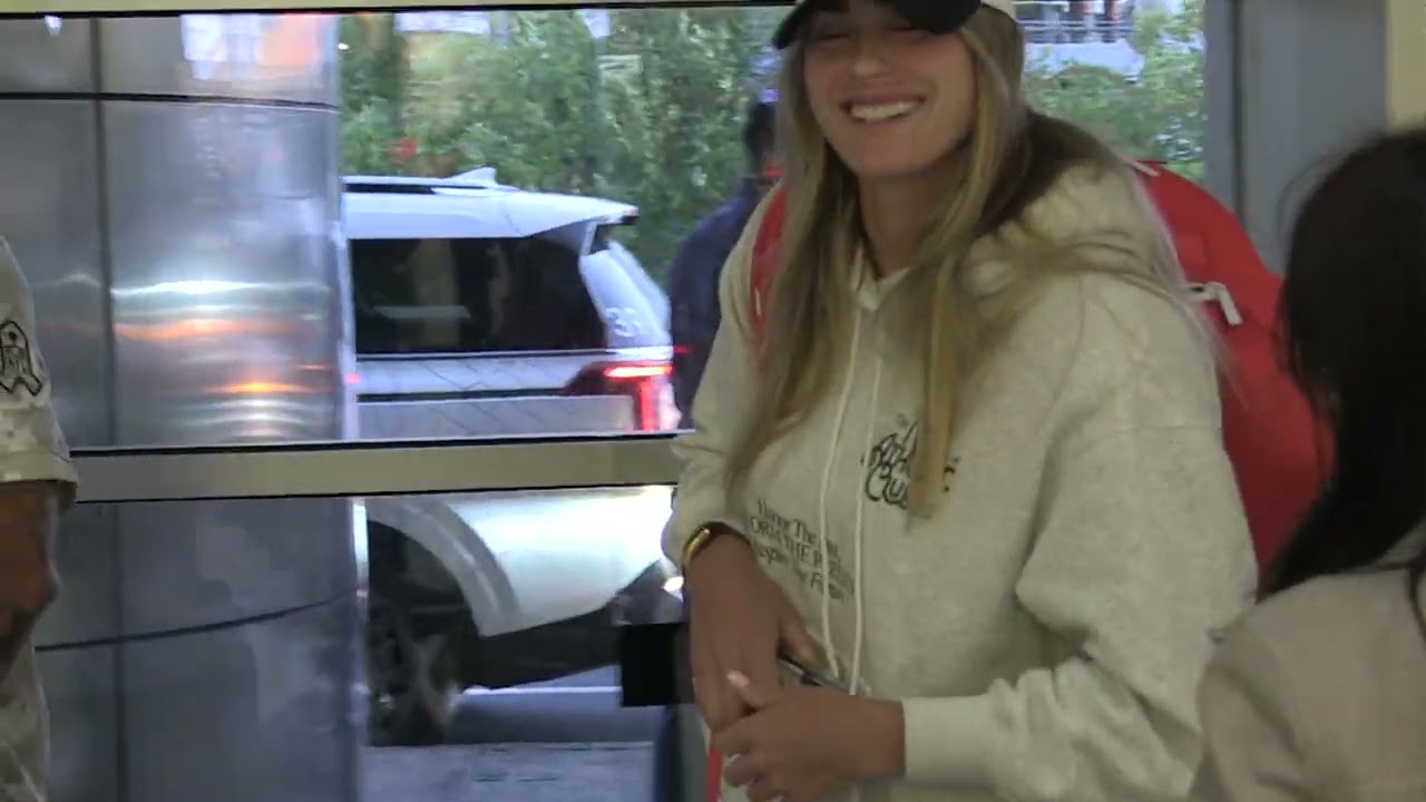 Tennis world no.1 ARYNA SABALENKA & GEORGIOS FRANGULIS fly home after losing Australian Open final
