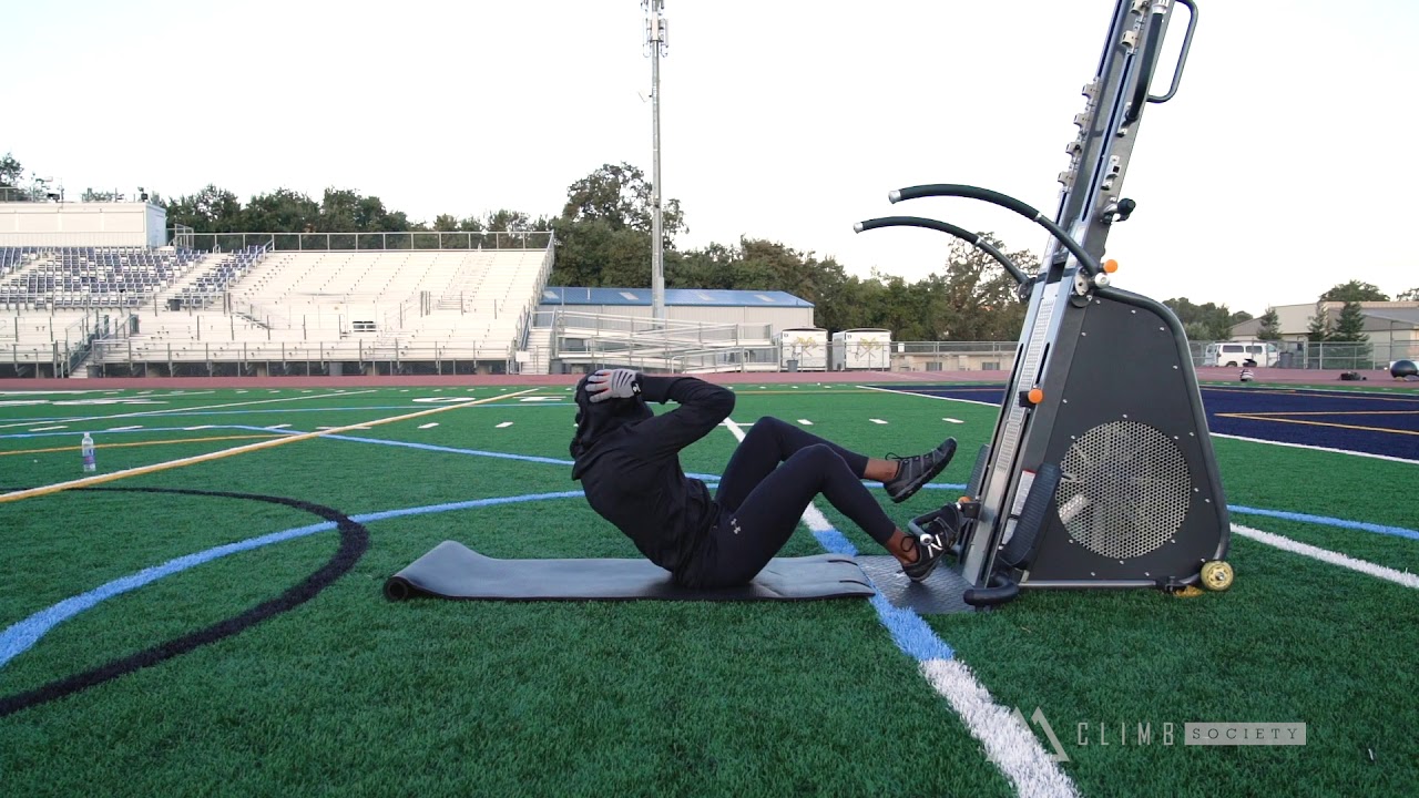 Unilateral Oblique Sit Up with Knee Tuck