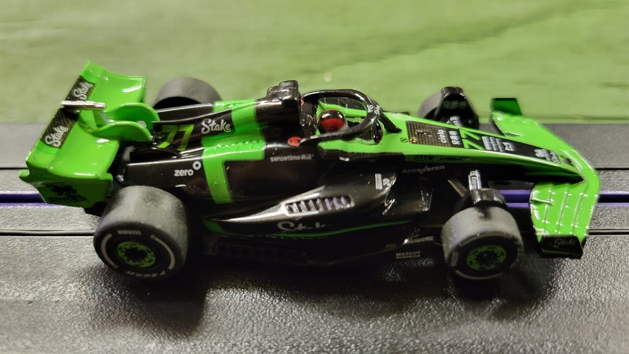 AFX Sauber F1 #77 C44 Stake FY Mega G+ HO Slot Car