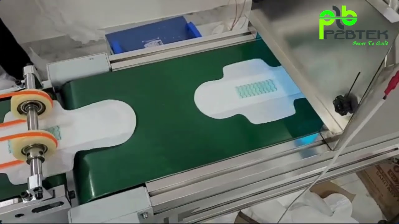 Fully Automatic Sanitary Napkin Pad  Machine with Auto Glue Spray and UV Sterilizer. Model- P-120