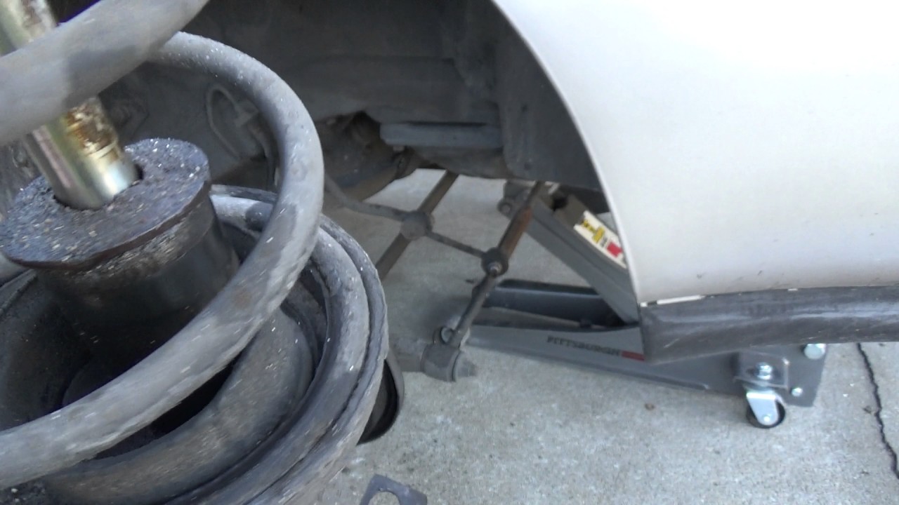 How to Replace Rear Struts 1995 Toyota Corolla