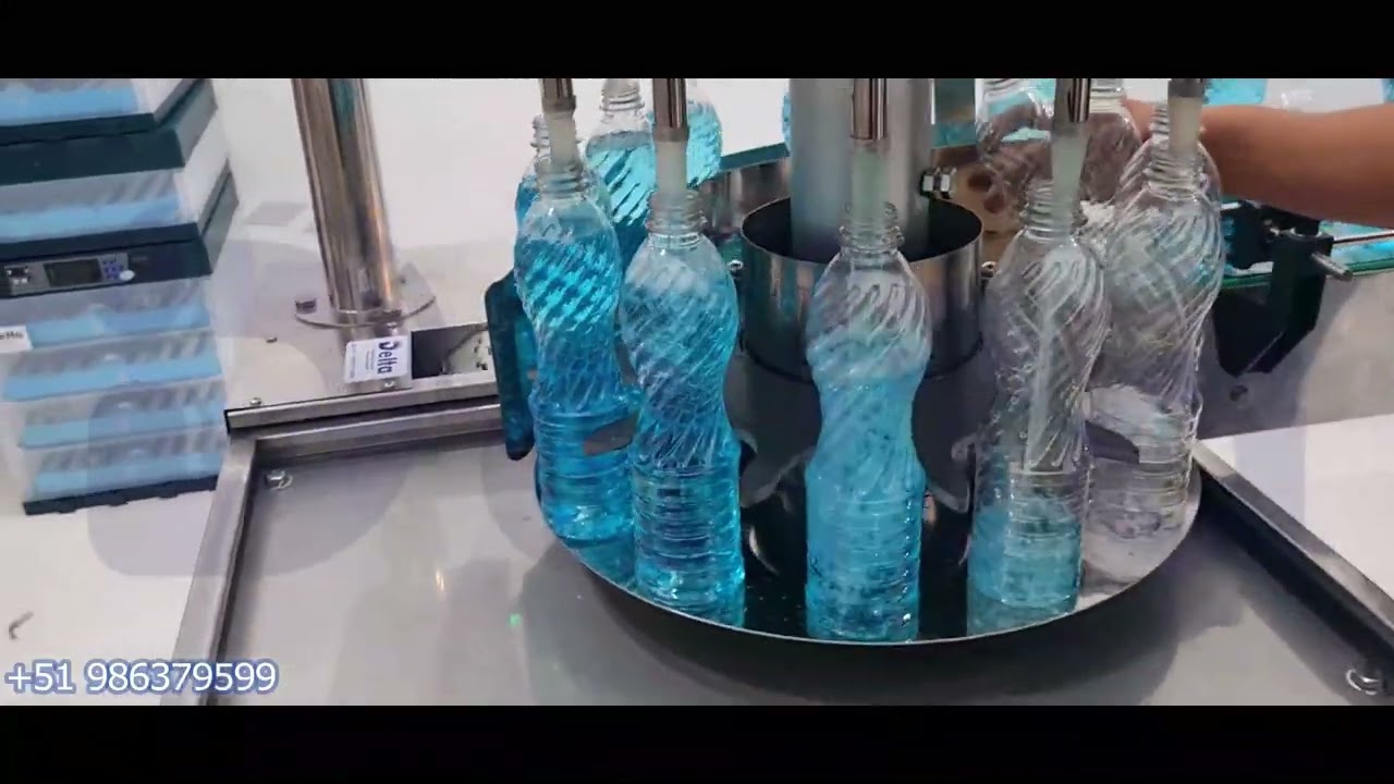 Máquina Llenadora Automática Giratoria Continua de Líquidos por Gravedad 30 bot/min DELTA PERU
