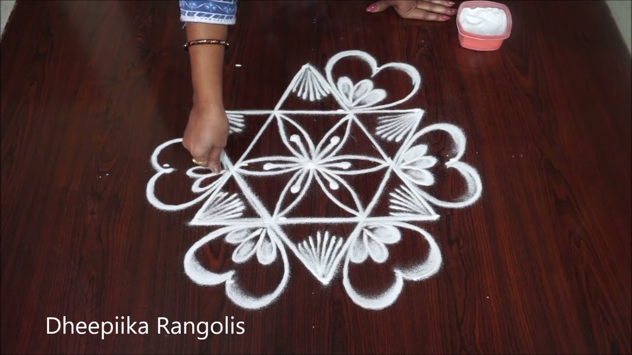 Beautiful star rangoli design with 5 dots // #festival muggulu #friday kolam