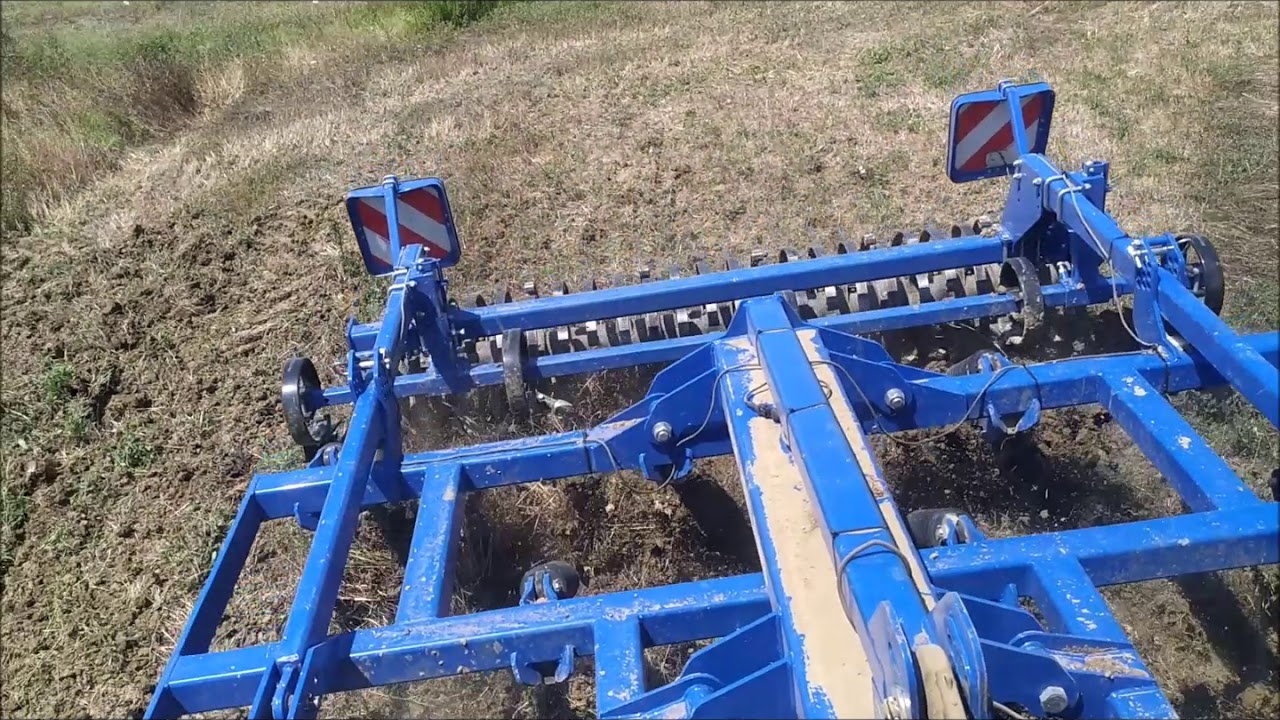 Coltivatore New Holland STC 300RS + su stoppia di Fieno