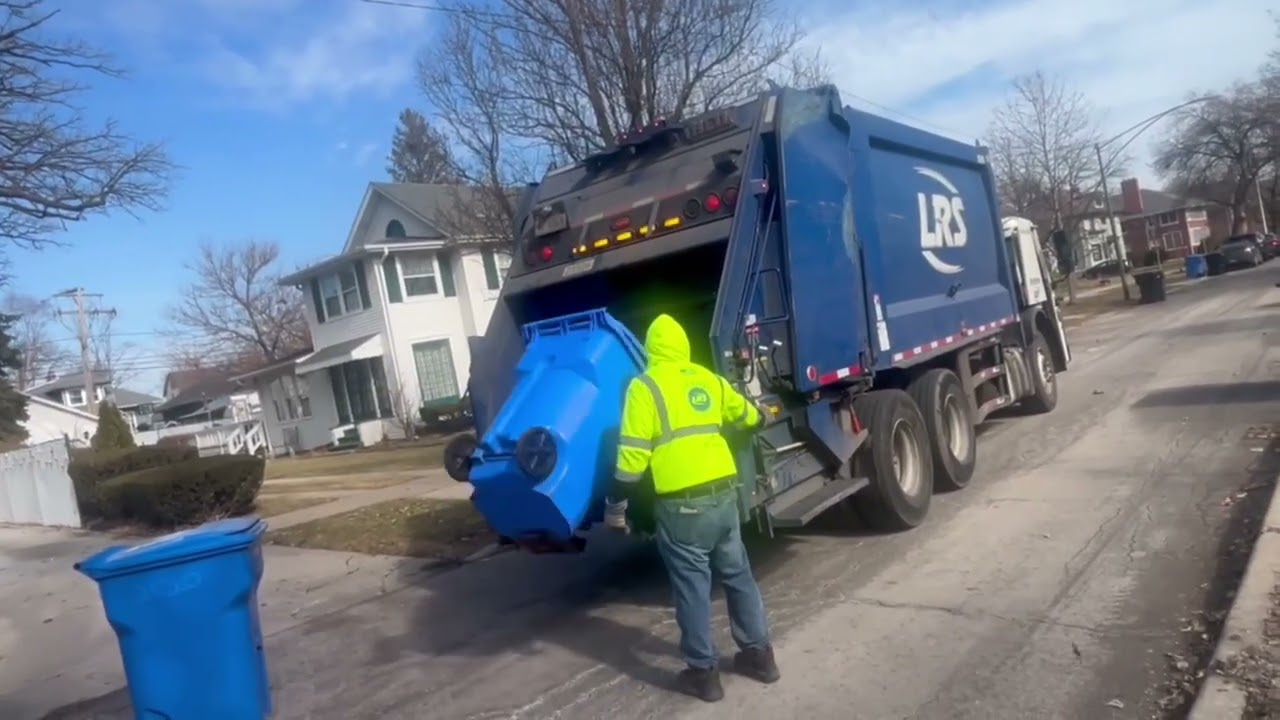 A Compilation Of Two Rear Loader Garbage Trucks In Action