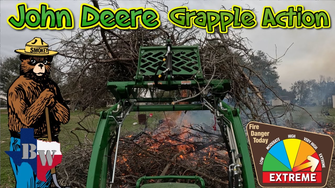 John Deere Feeding the Fire!  1025R 2025R AV20F Grapple