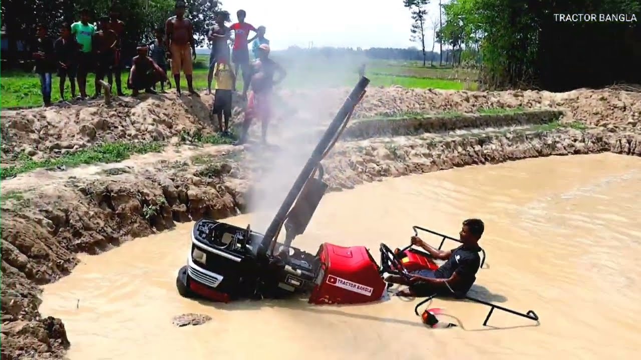 Unbelievable! Mahindra tractor pulls out from the pond