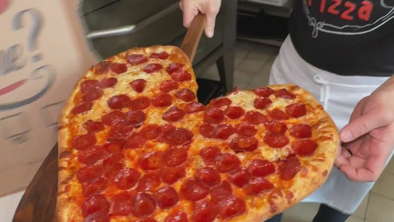 Celebrate Valentine's Day with heart-shaped pizzas