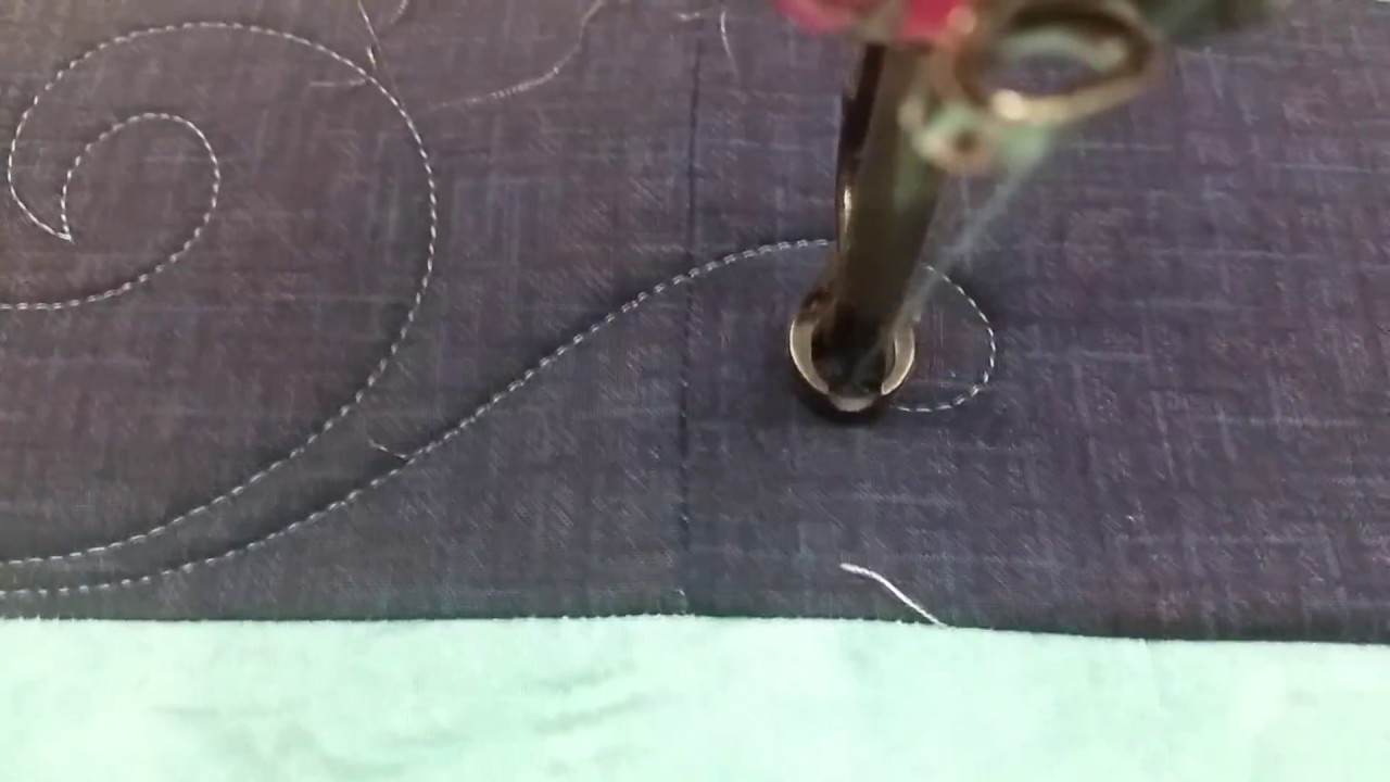 Waves border longarm quilting freemotion hand guided