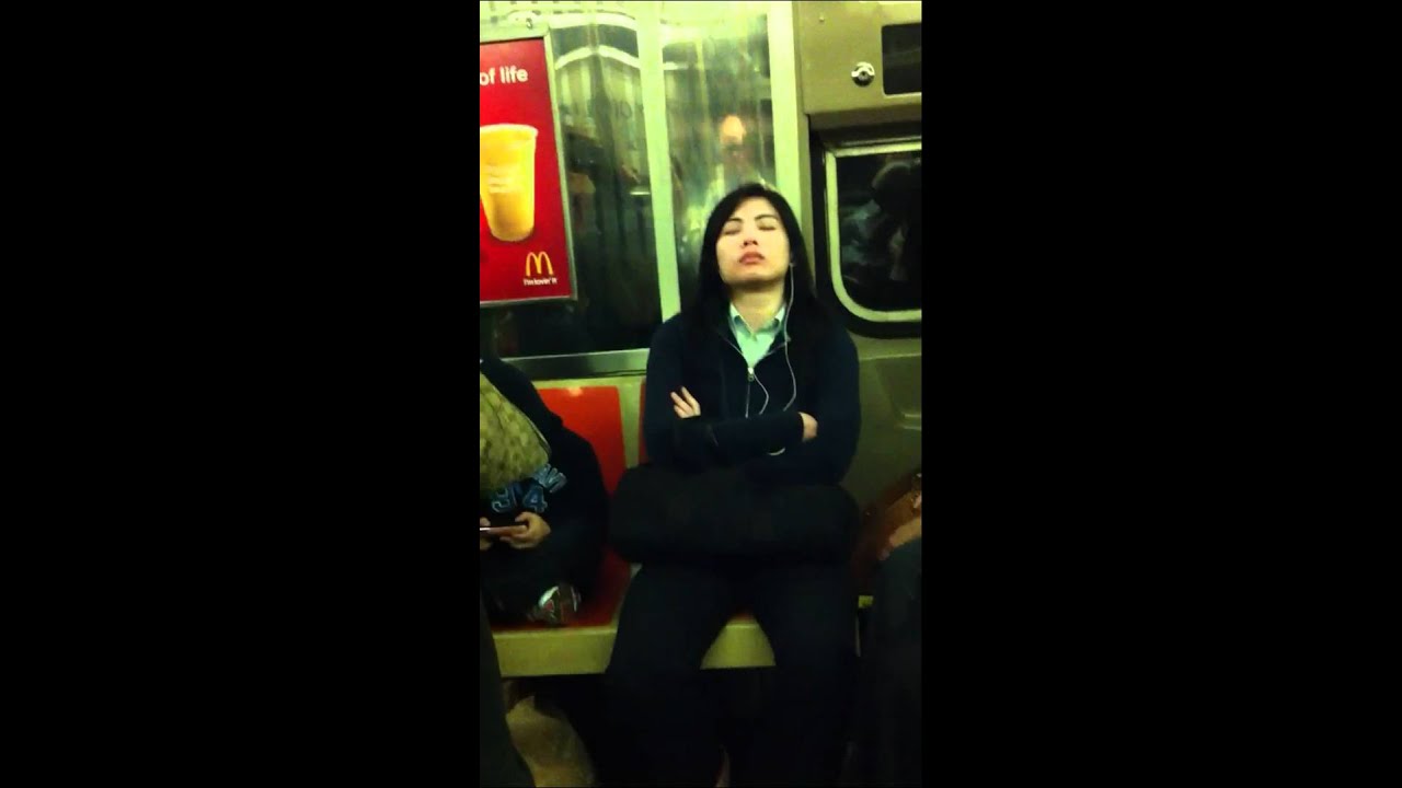 Chinese women sleeping on the train watch the kid next to h