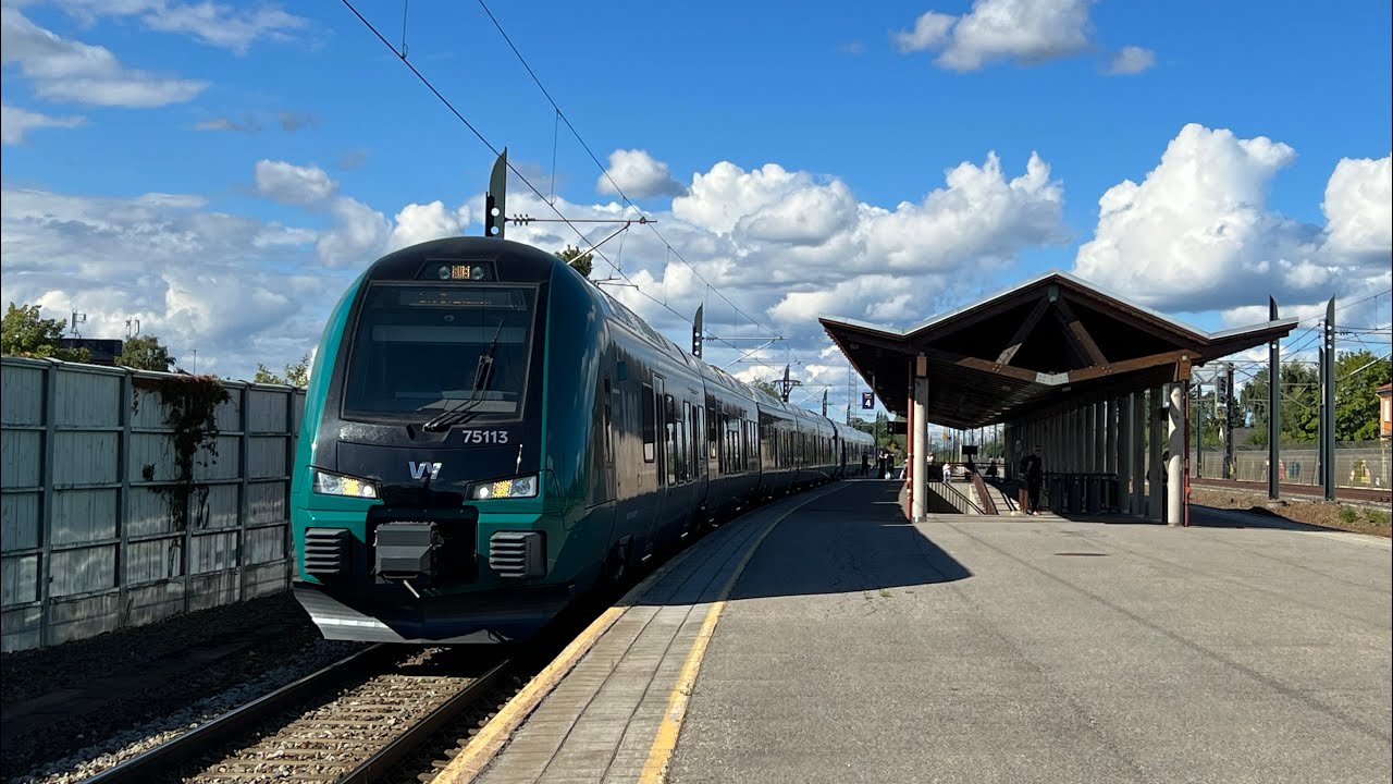 Trains at Kløfta station (Vy, Flytoget, SJ-Nord, CargoNet and Green Cargo)