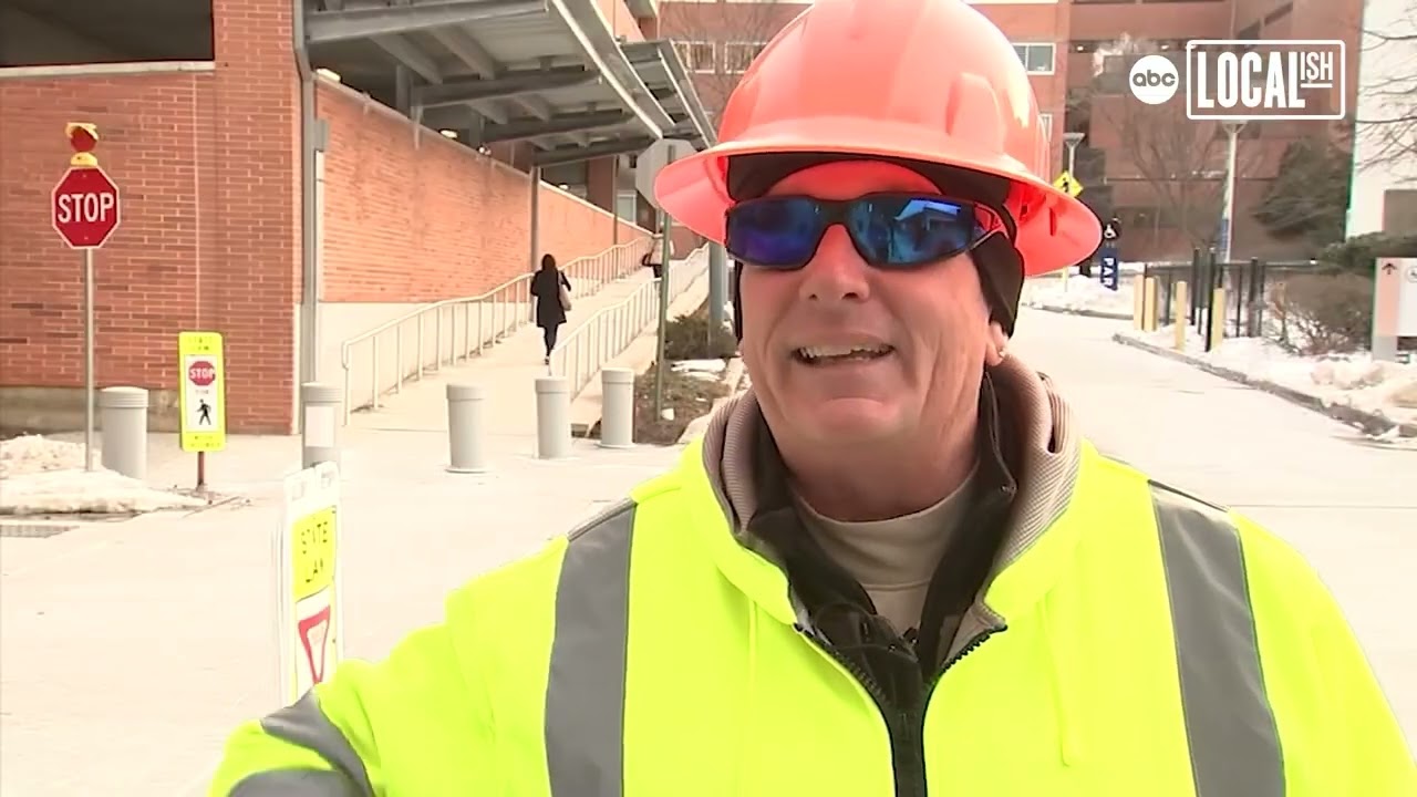 Crossing guard's warm greetings brighten cold mornings