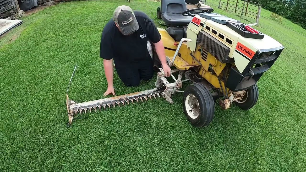 Installing Sears suburban sickle bar knife and quick test cutting.