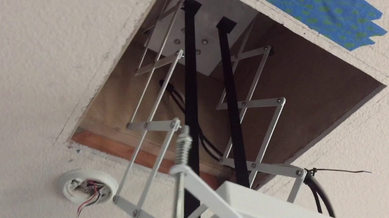 Motorized projector lift