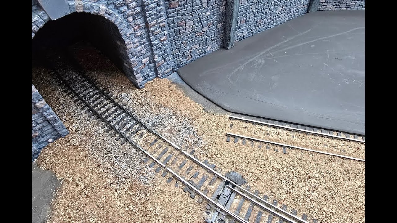 Layout Update. Buried Track. Burying the Stonewall Section of Track in Dirt.