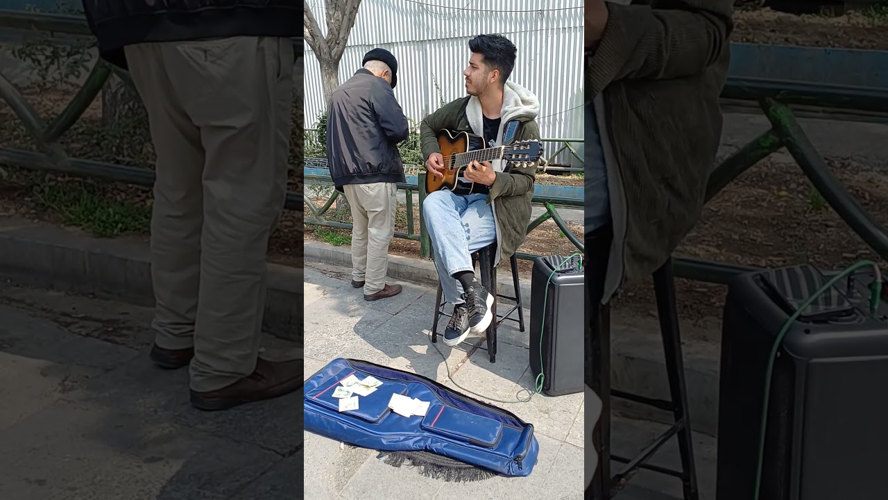 #See Iran with boshra .Listen to the song of the street musician.#iran #bazar