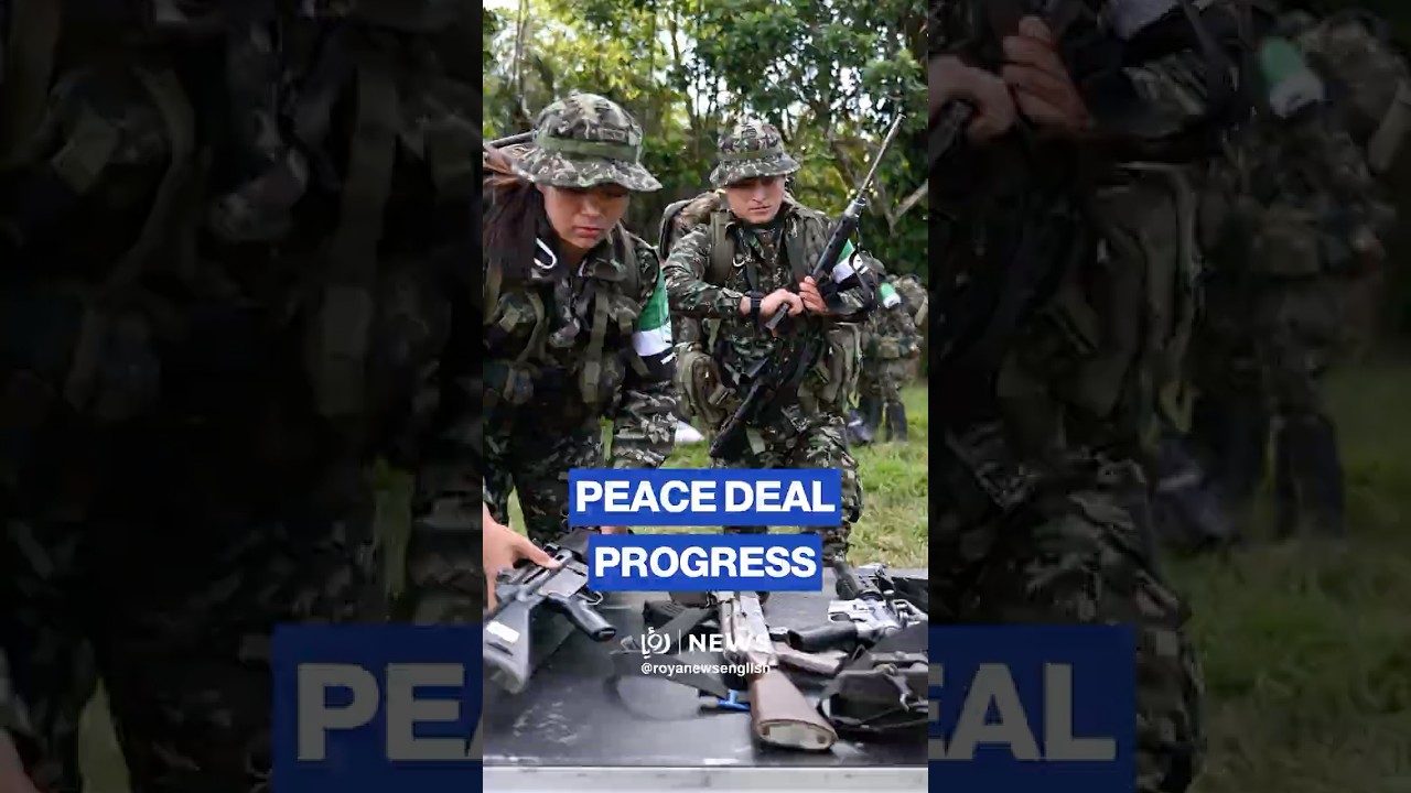 100 Colombian guerrillas disarm in deal with leftist government