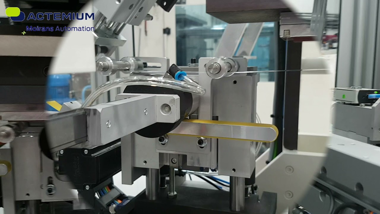Peripheral Hot Stamping Machine for cosmetic parts in line with a plastic injection molding machine