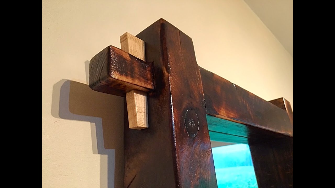 Wedged through mortise and tenon mirror frame
