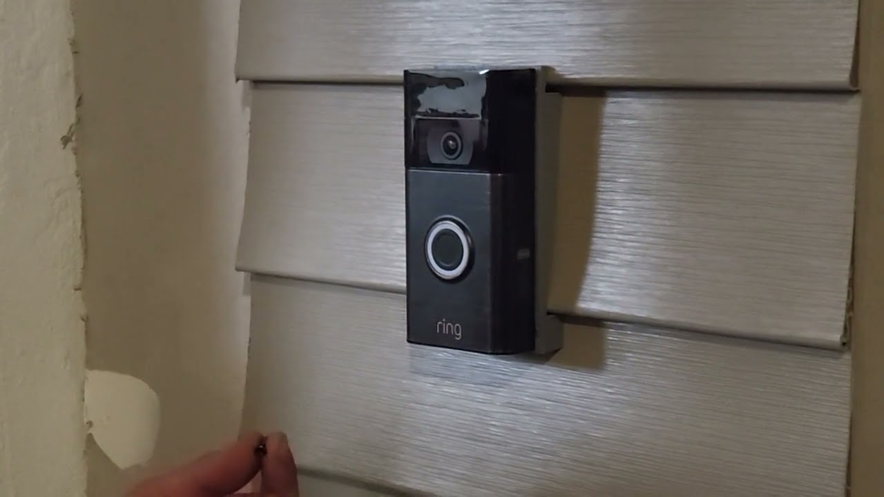 installing a ring video doorbell on vinyl siding with a vinyl siding adapter.