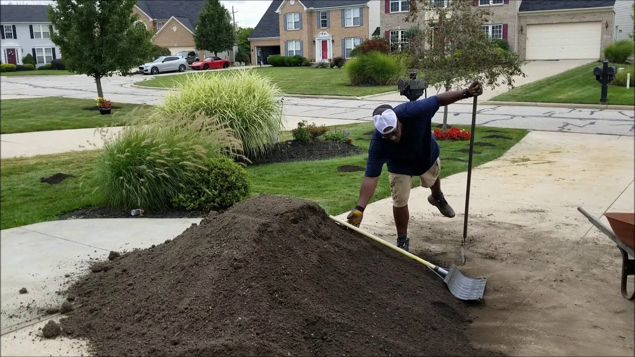 Top dressing, aerating and overseeding lawn  | A How To about aerating and top dressing a lawn