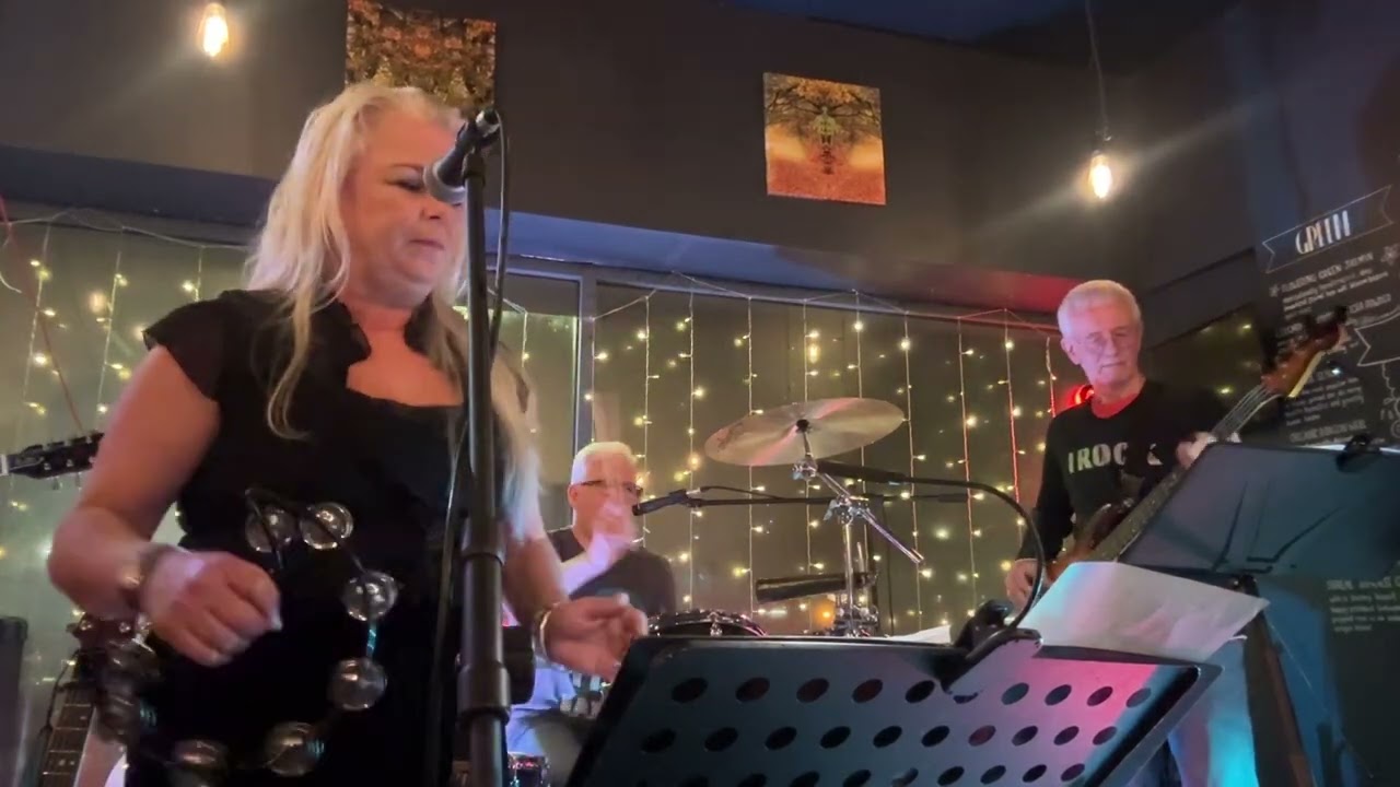 Dancing with no Shoes on - written by Simon Mellor the drummer. 