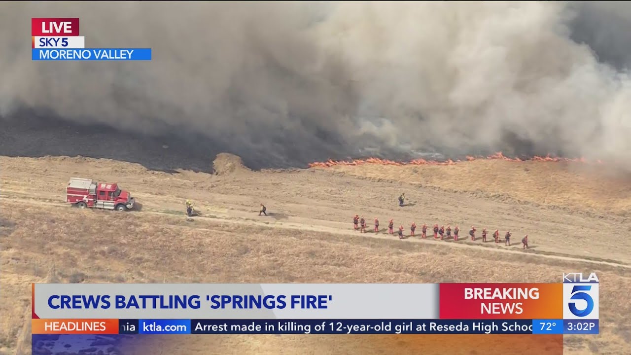 Crews battle Santa Ana wind-fueled Springs Fire in Moreno Valley