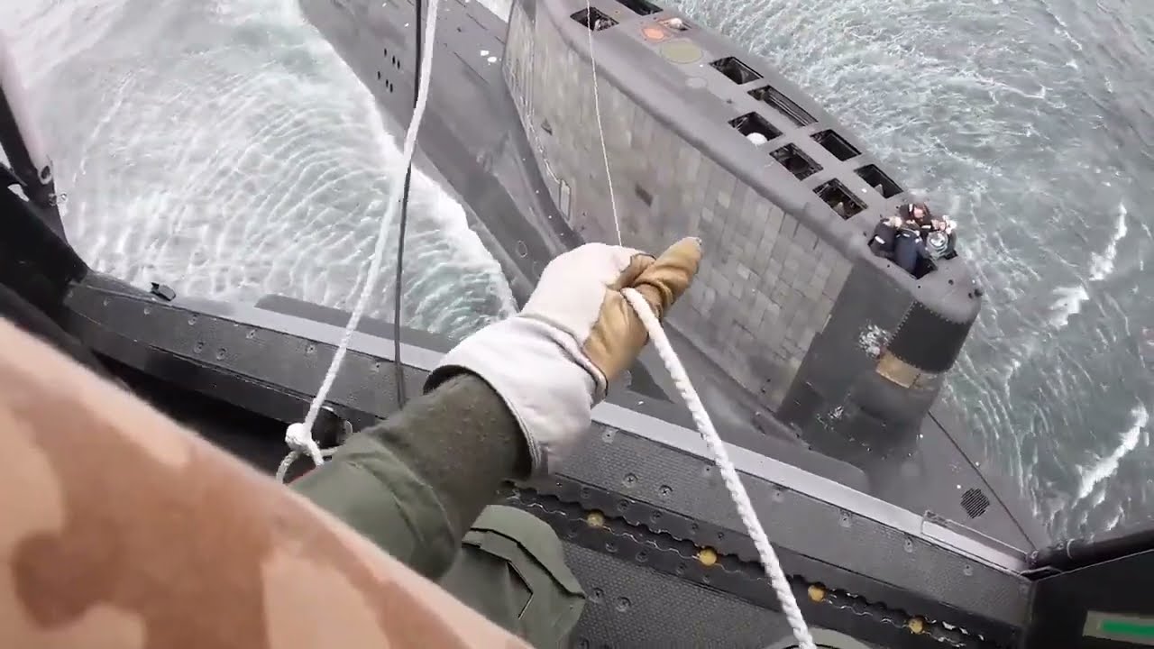 Helicopter medical evacuation of submariner casualty from Astute class submarine