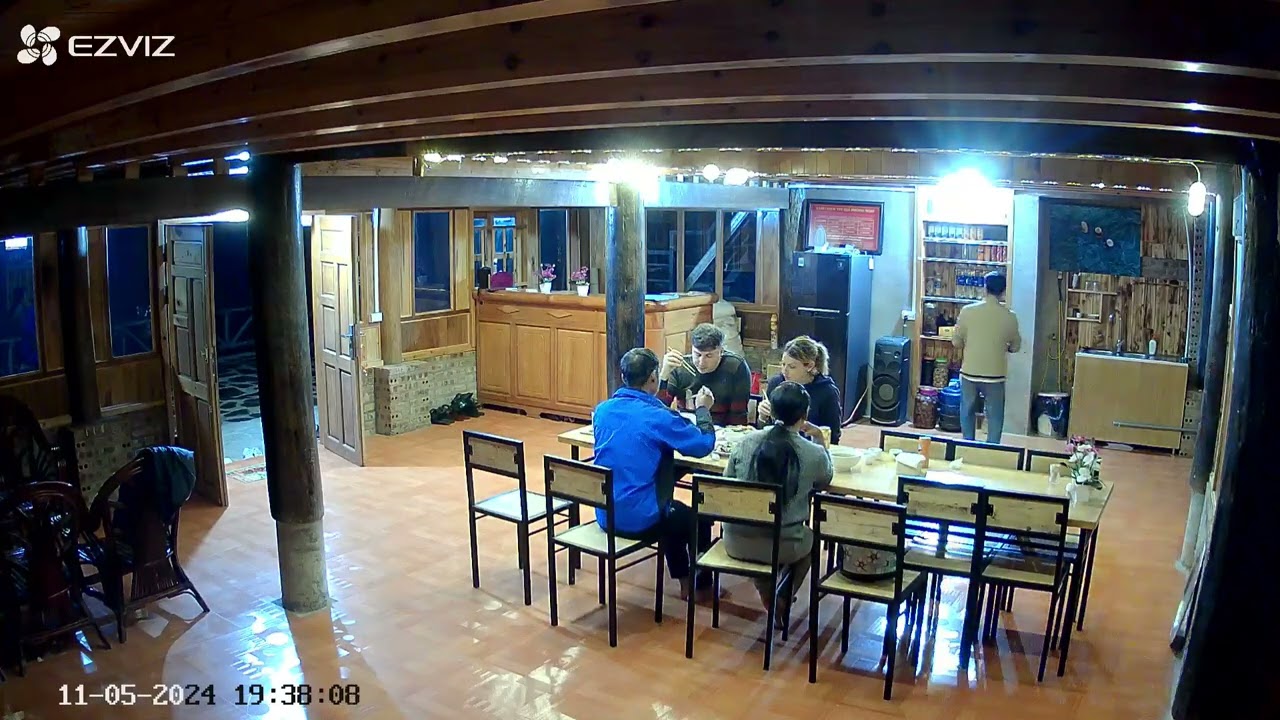 Dining together with local family at Nomadtrails Lodge