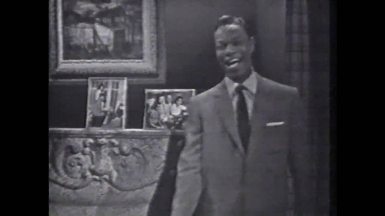 Nat King Cole  sings; 
