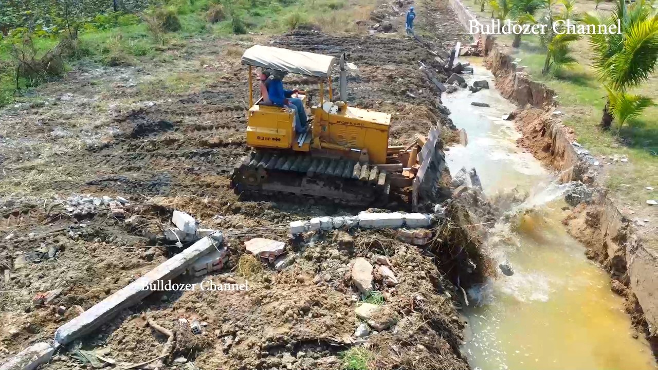 Good Expand Basic Road Bulldozer Komatsu D31P Clearing Forest In Areas Flood