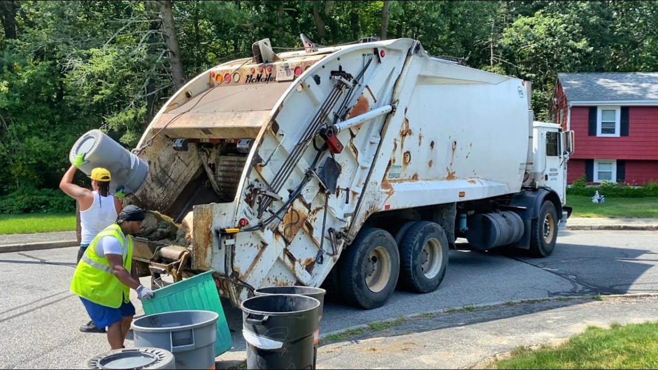 Roaring Beast Mack MR McNeilus Rearloader Flying through Summer Yardwaste
