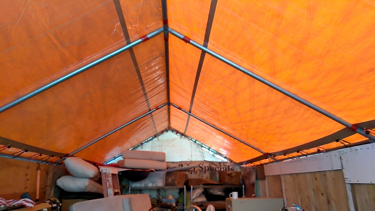 10 x 20 and 18 ml thick roof tarp with valence.