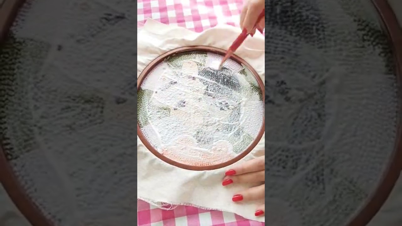 applying glue into back of my punch wall hanging 💧🧶 #punchneedle #handmade