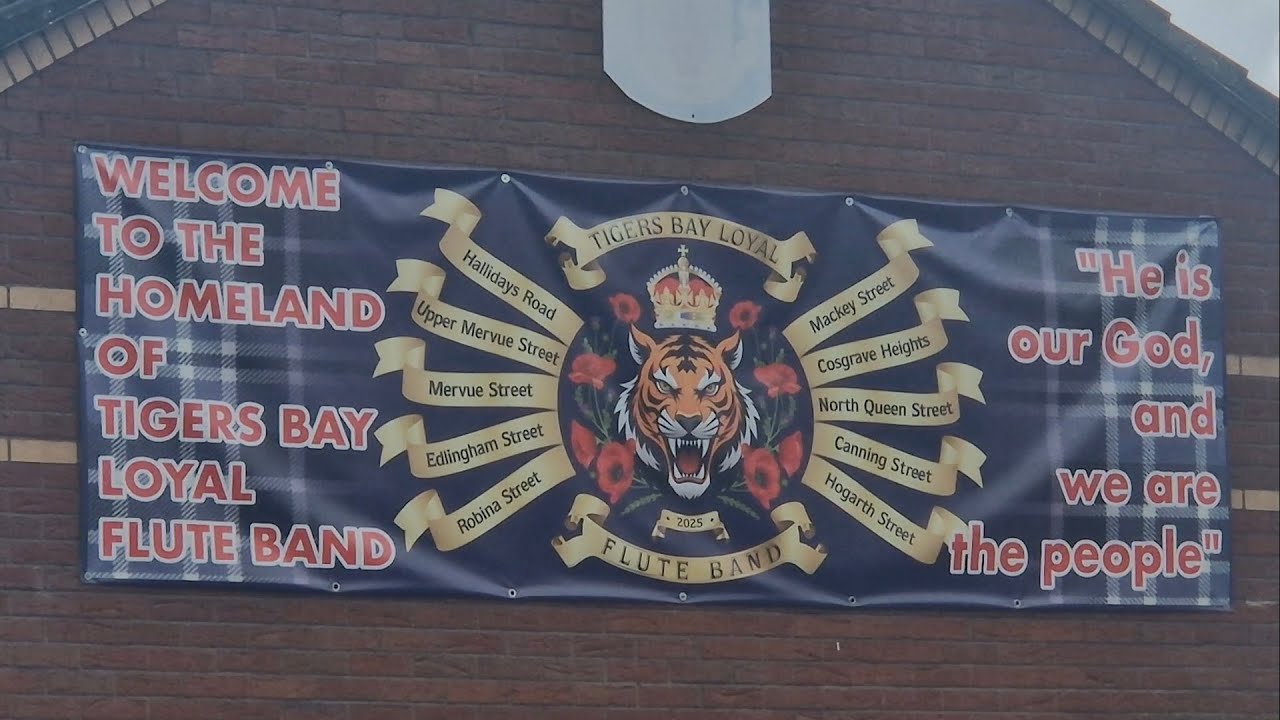 Loyalist Mervue Street, Tigers Bay, North Belfast, Raising the Colours, the Banners and the Flags. 