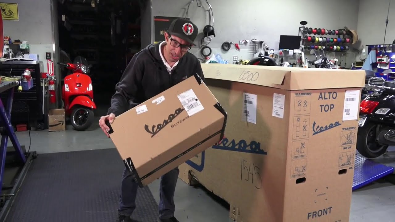 Robot Unboxes a Brand New 1951 Vespa!