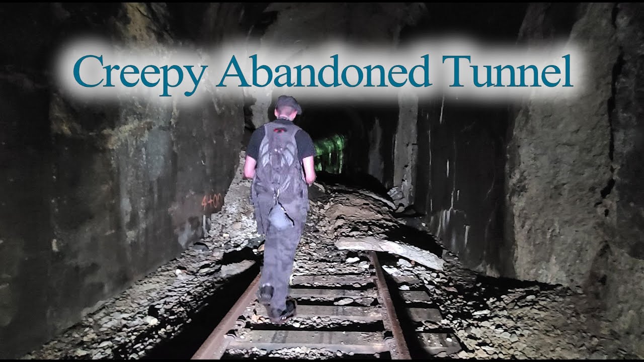 Abandoned Railroad Tunnel with Rails Still Intact