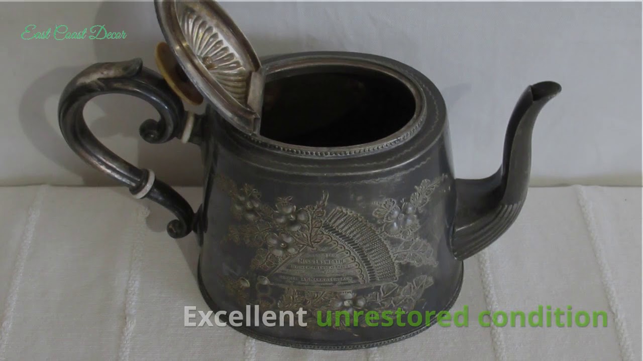 Antique finely engraved silver plate tea pot