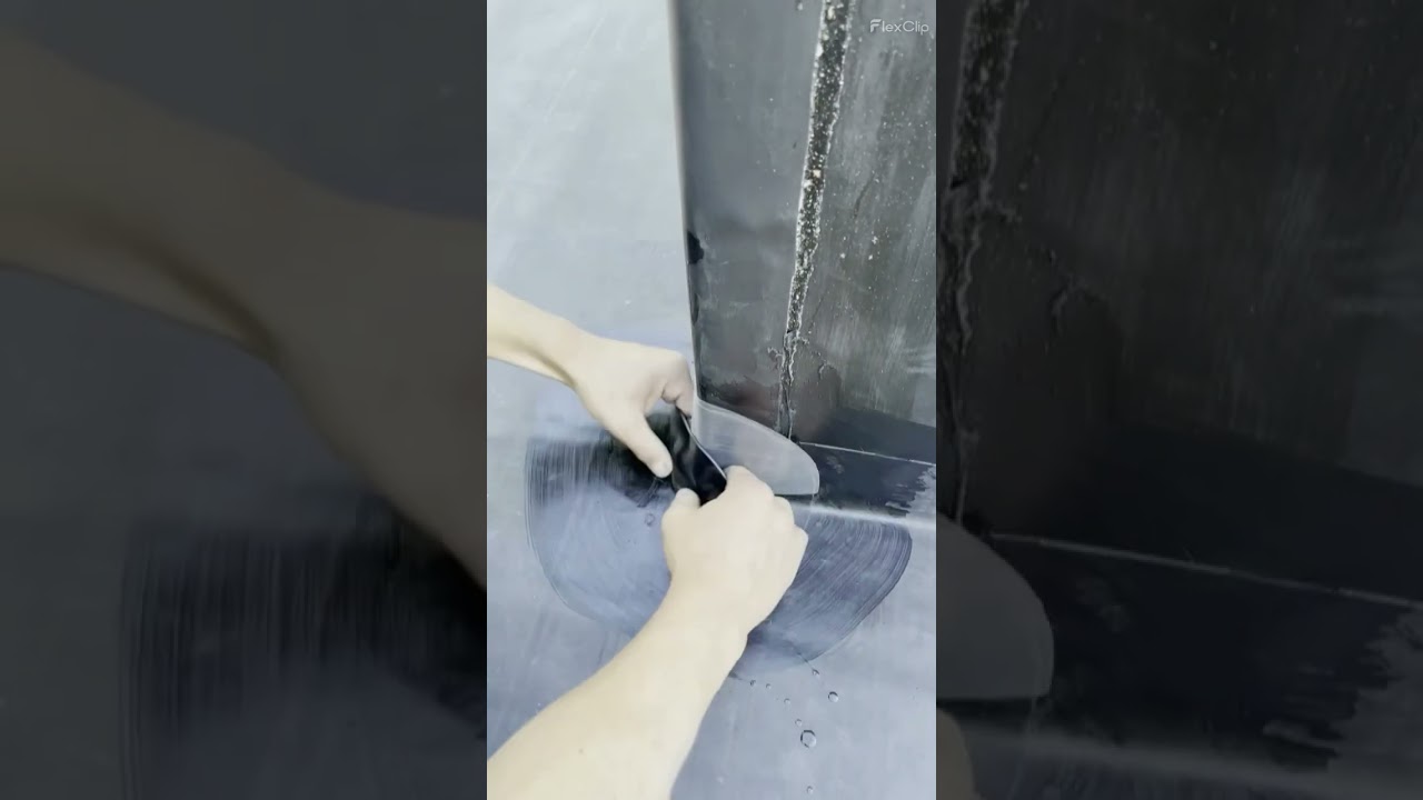 Installing a corner patch on a EPDM Rubber membrane.