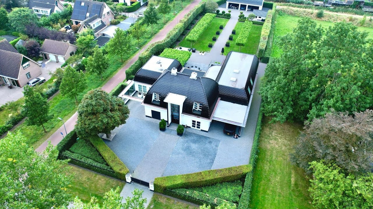 Epische villa met binnenzwembad, gym, jacuzzi, enorme garage, etc.. kortom: WAUW